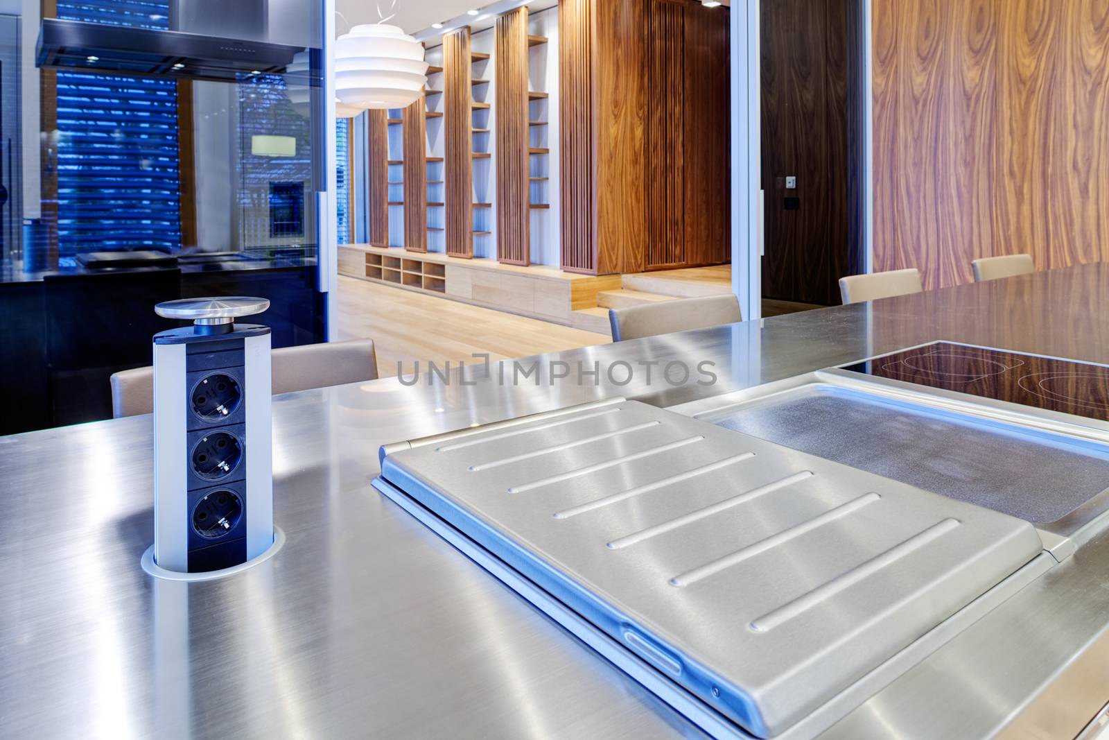 Modern kitchen interior with stainless steel sink and appliances