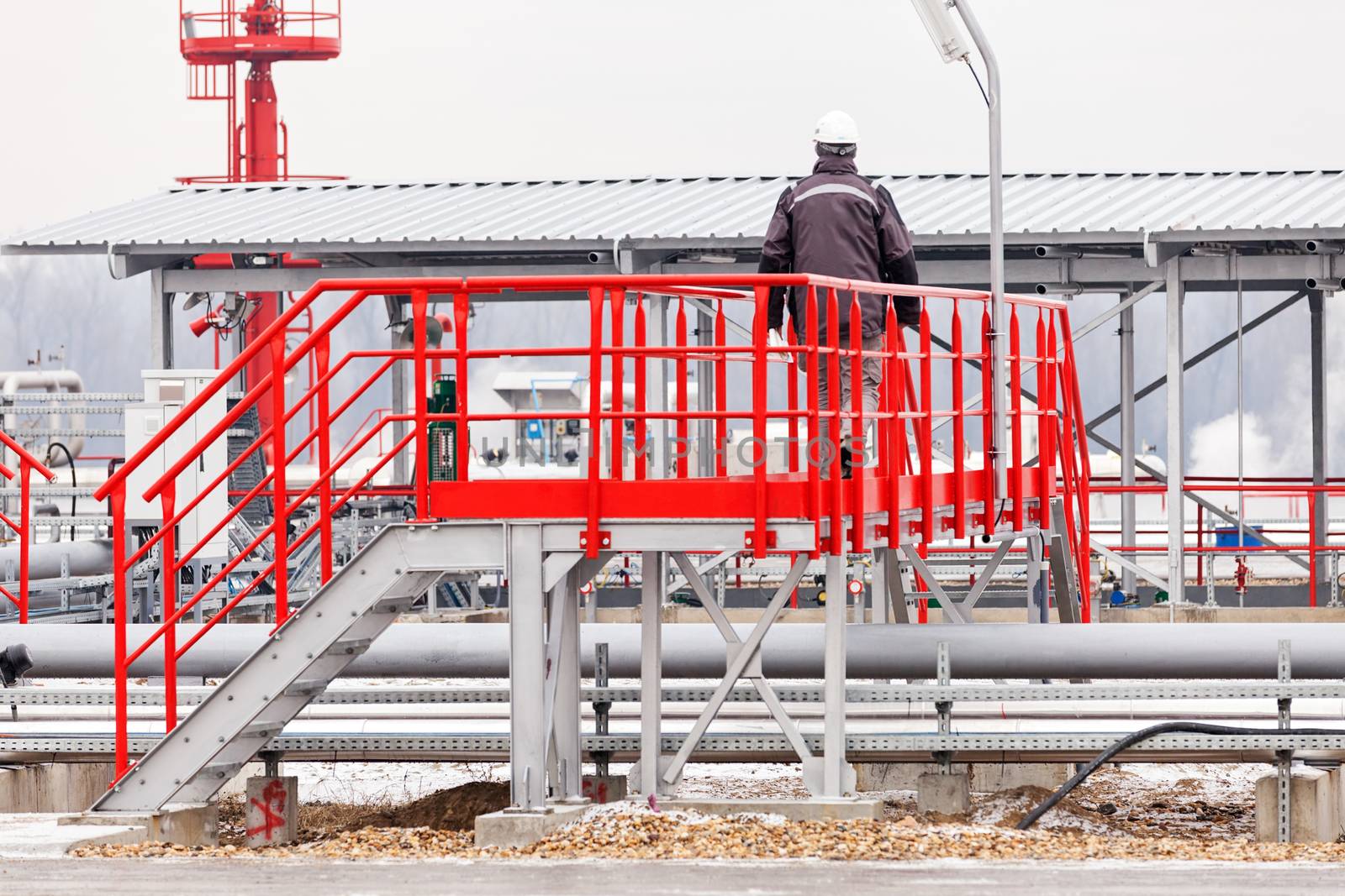 detail of oil pipeline with valves in large oil refinery