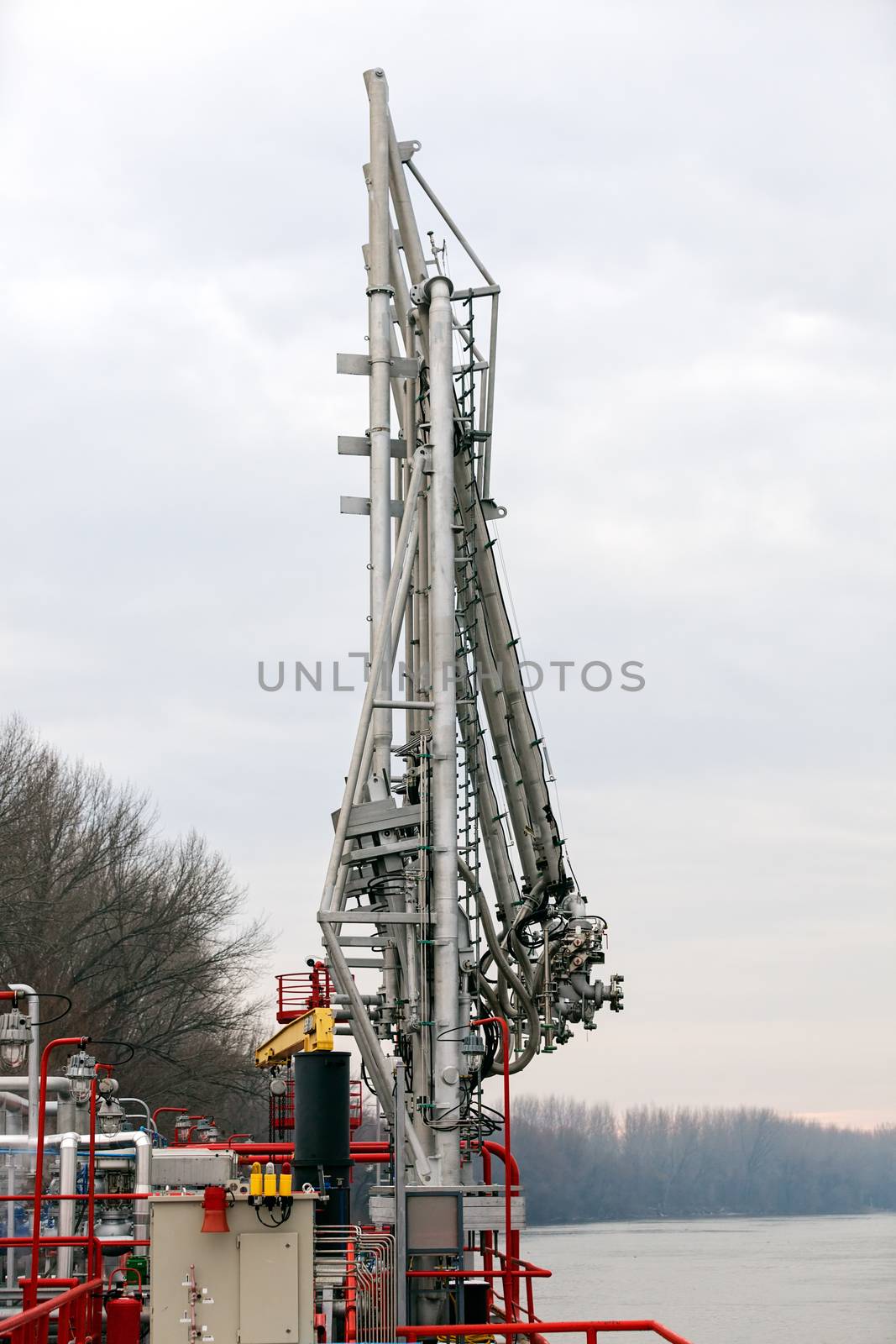 detail of oil pipeline with valves in large oil refinery