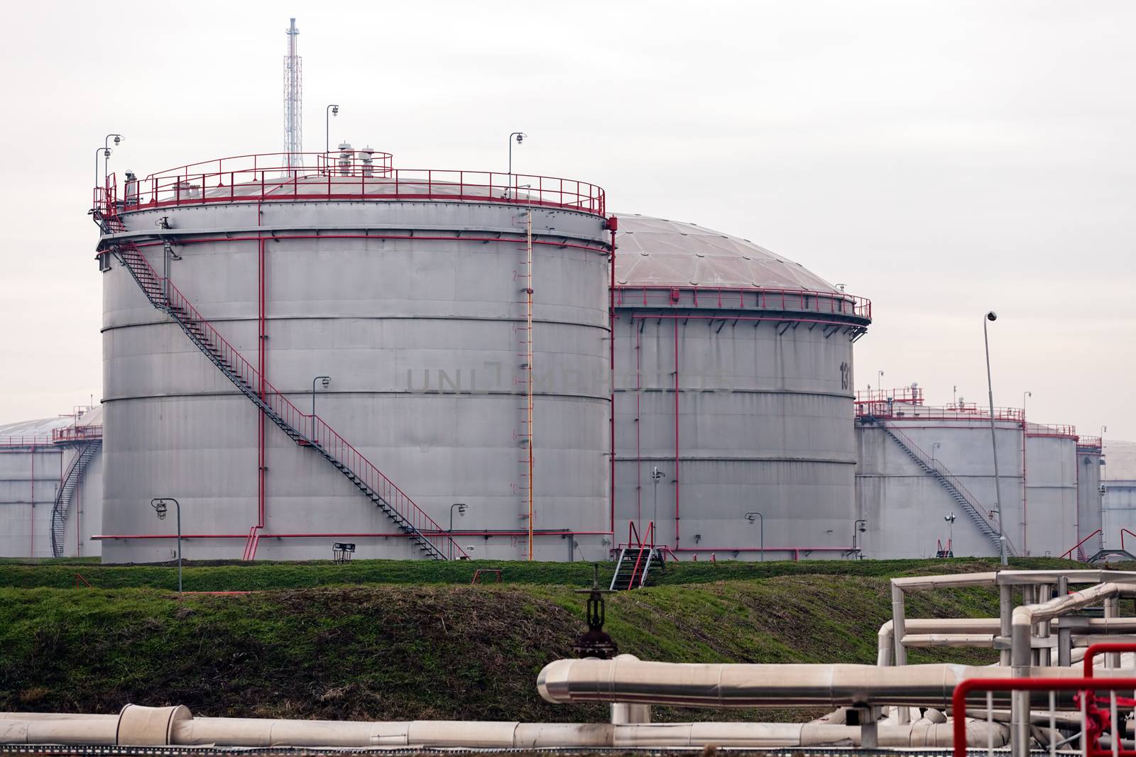 detail of oil pipeline with valves in large oil refinery