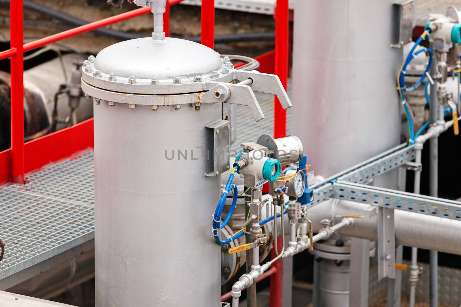 detail of oil pipeline with valves in large oil refinery