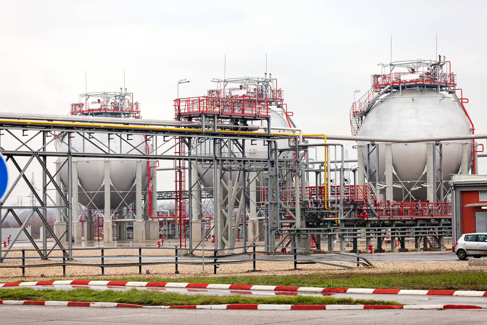 detail of oil pipeline with valves in large oil refinery