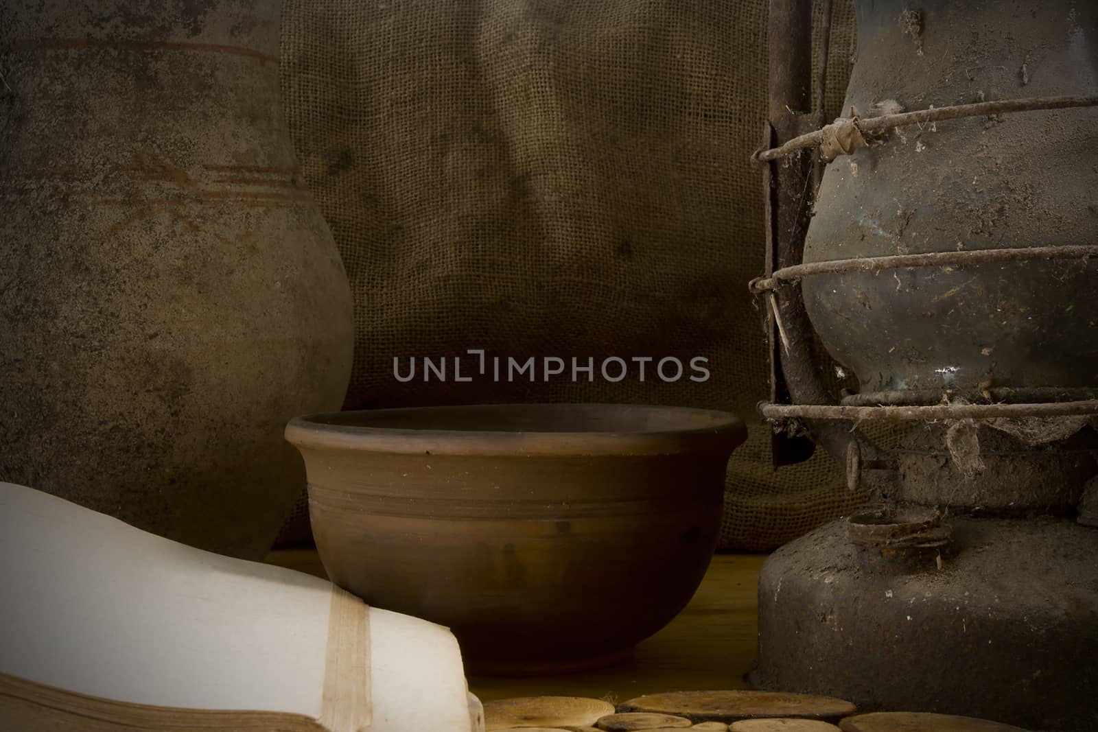 Vintage still life with pottery on the background of sacking