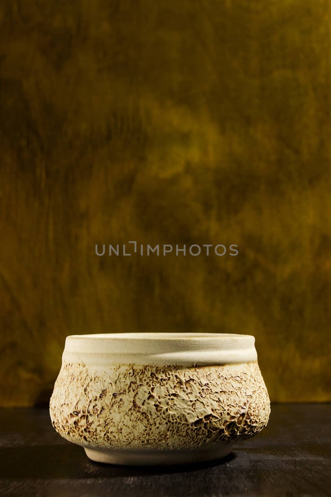 Beautiful ceramic dish on a wooden background
