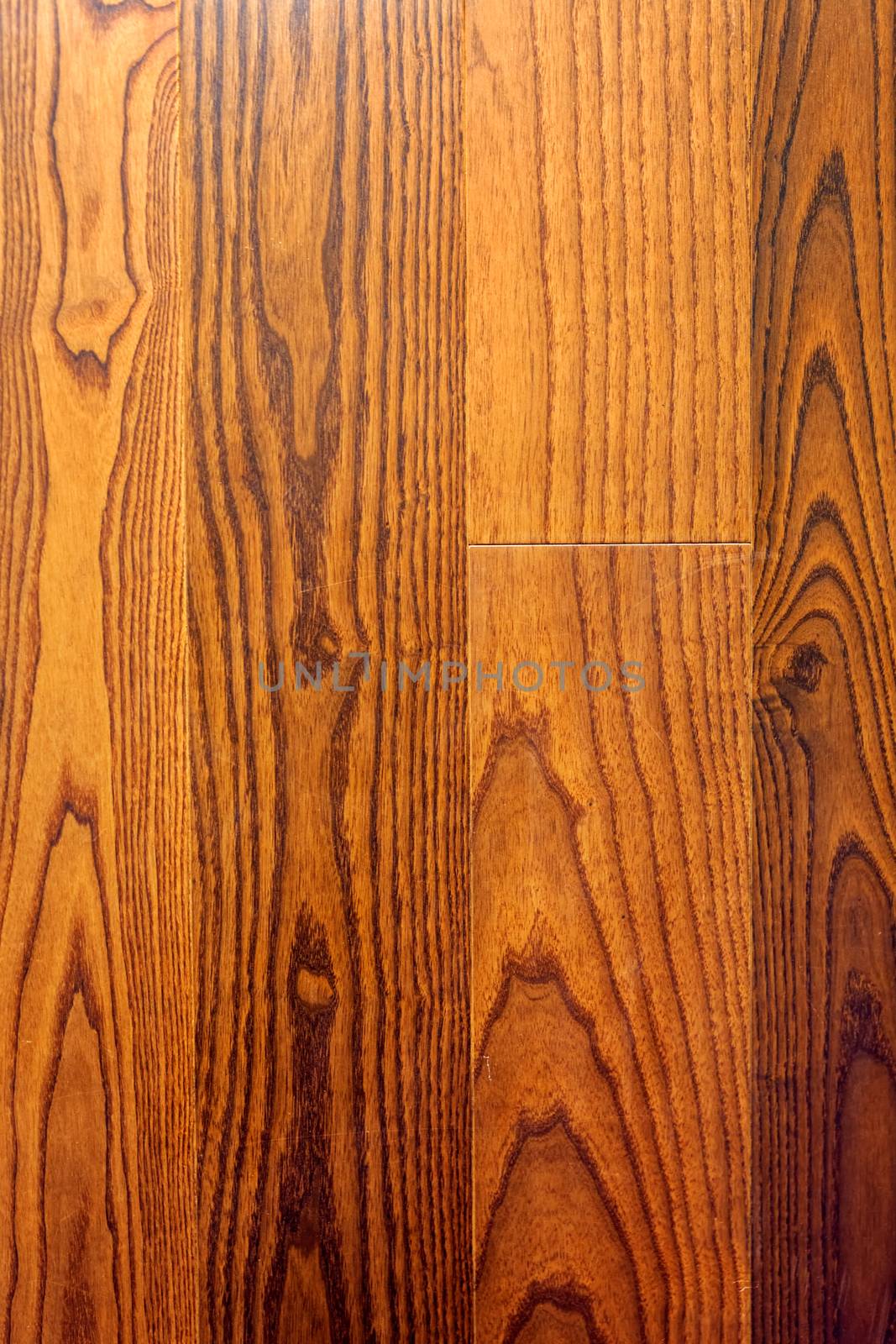 texture of wooden worm colored parquet floor