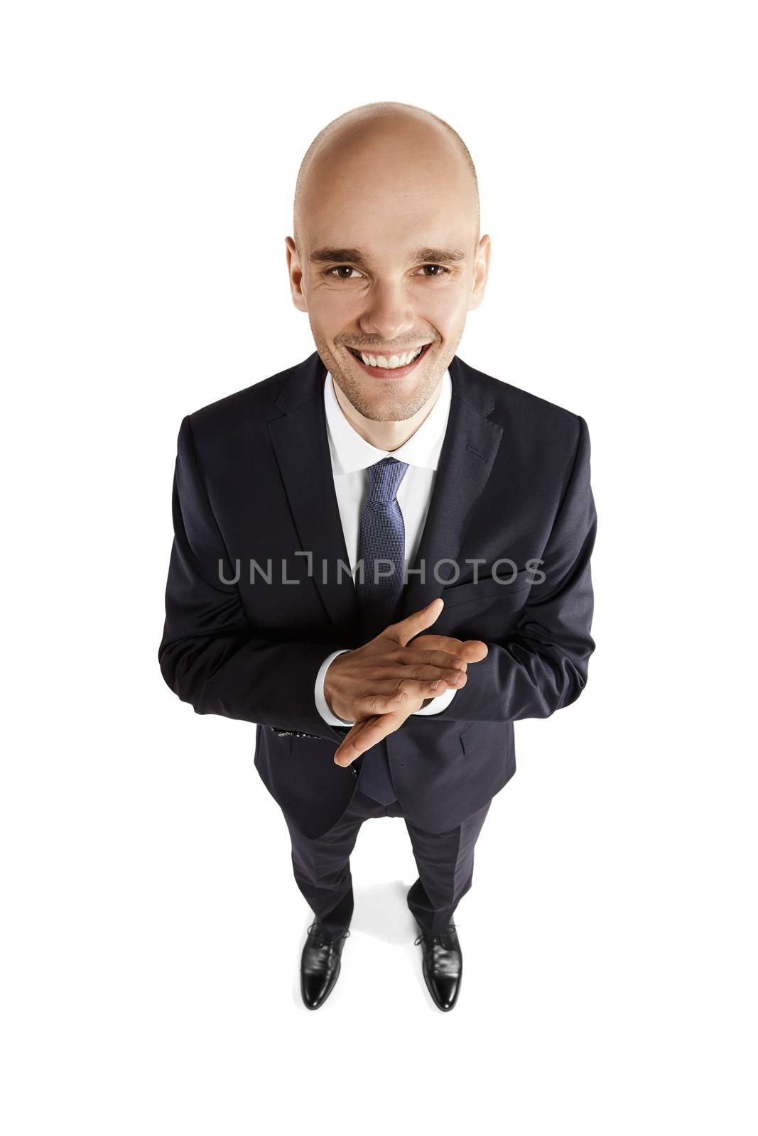 Overhead view of a satisfied man. Portrait isolated on white background.