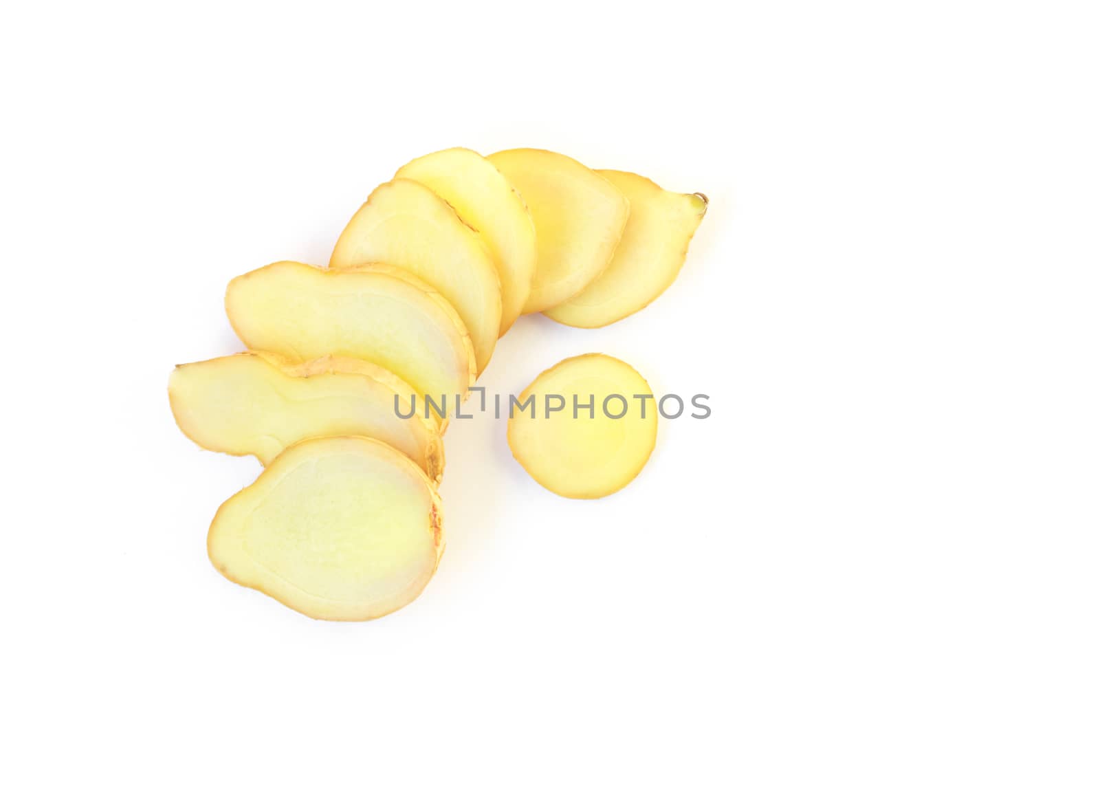Fresh ginger sliced on white background,raw material for cooking by pt.pongsak@gmail.com