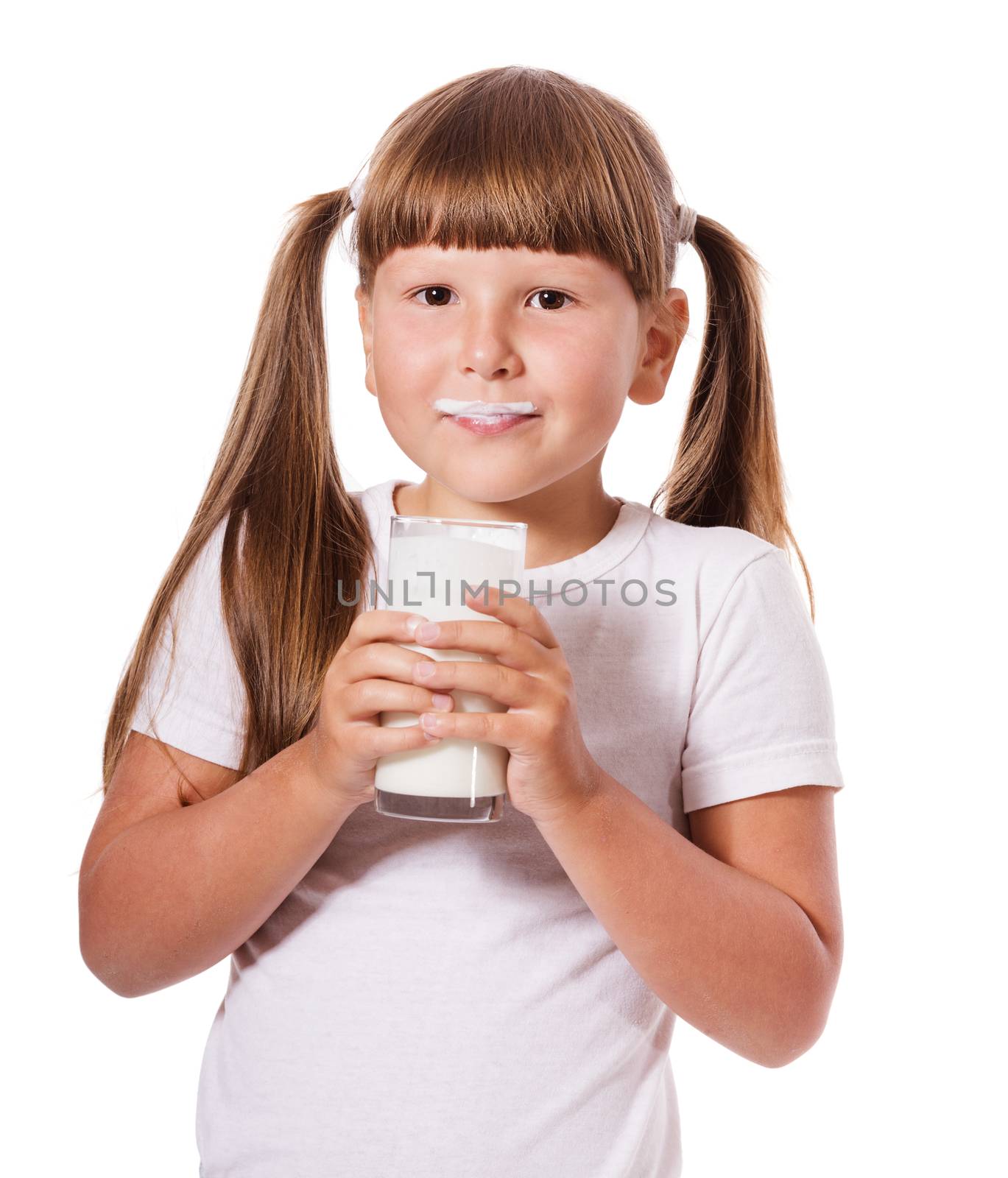 Six years Girl holding glass of milk isolated on white