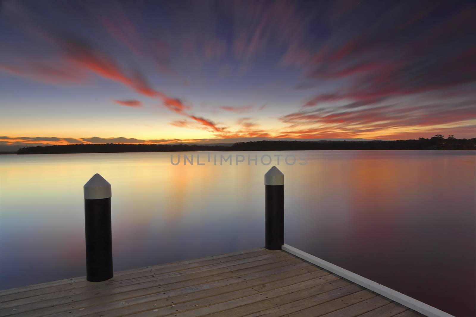 Relaxing at Kikatinalong Jetty long exposure after a vivid sunset