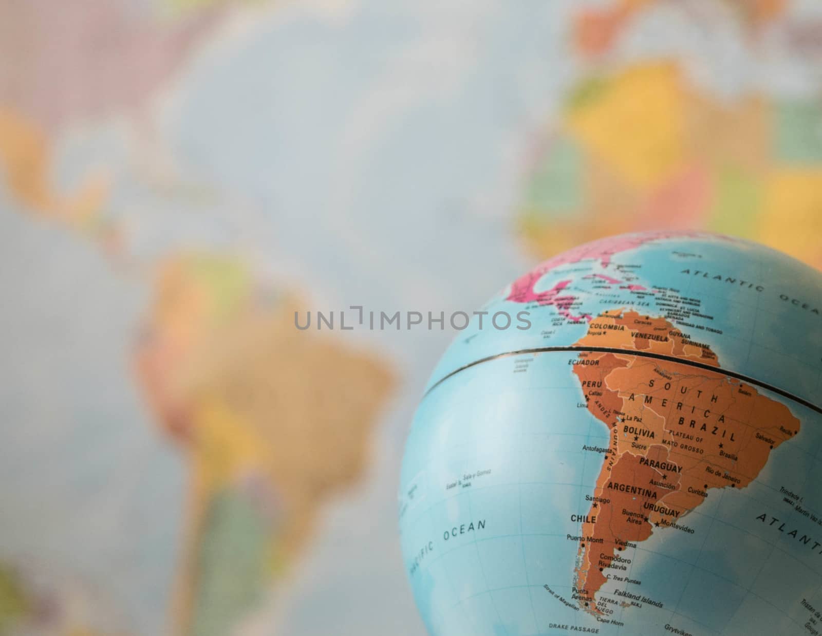 South America map on a globe with the whole world as background