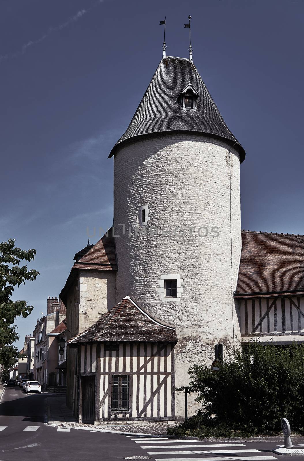 Wall and tower in the old town of Troyes, France