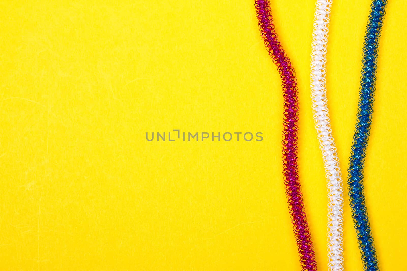 blue pink white rope on a yellow background