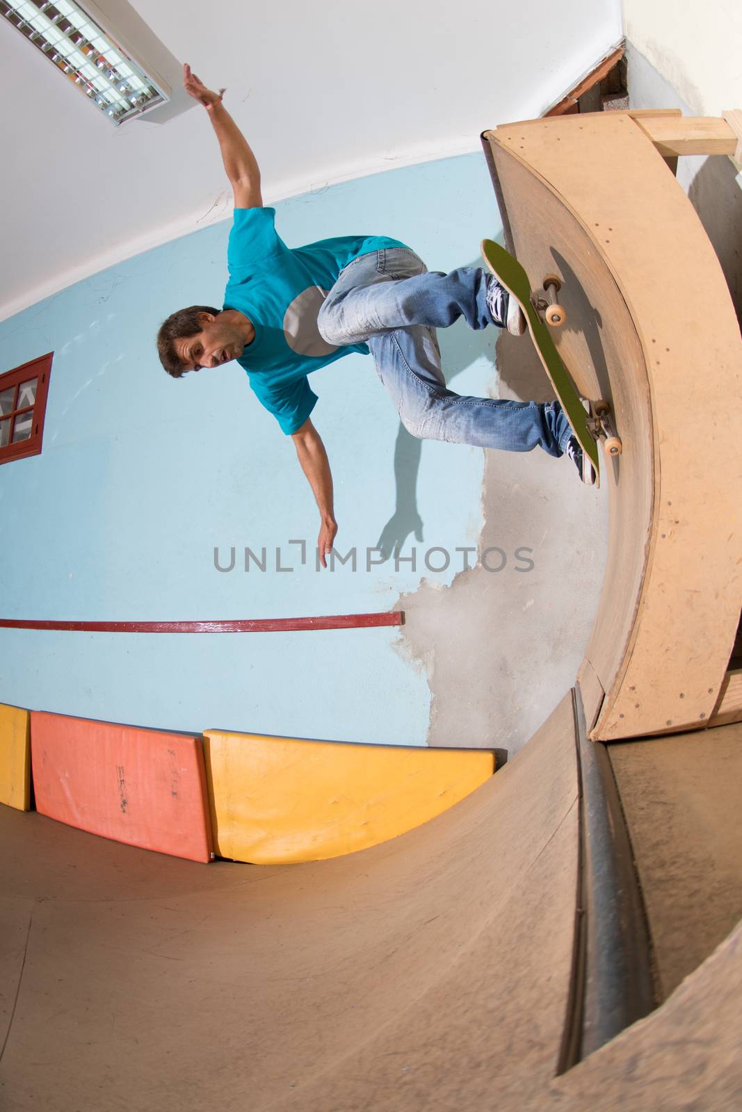 Skateboarder performing a backside turn by homydesign