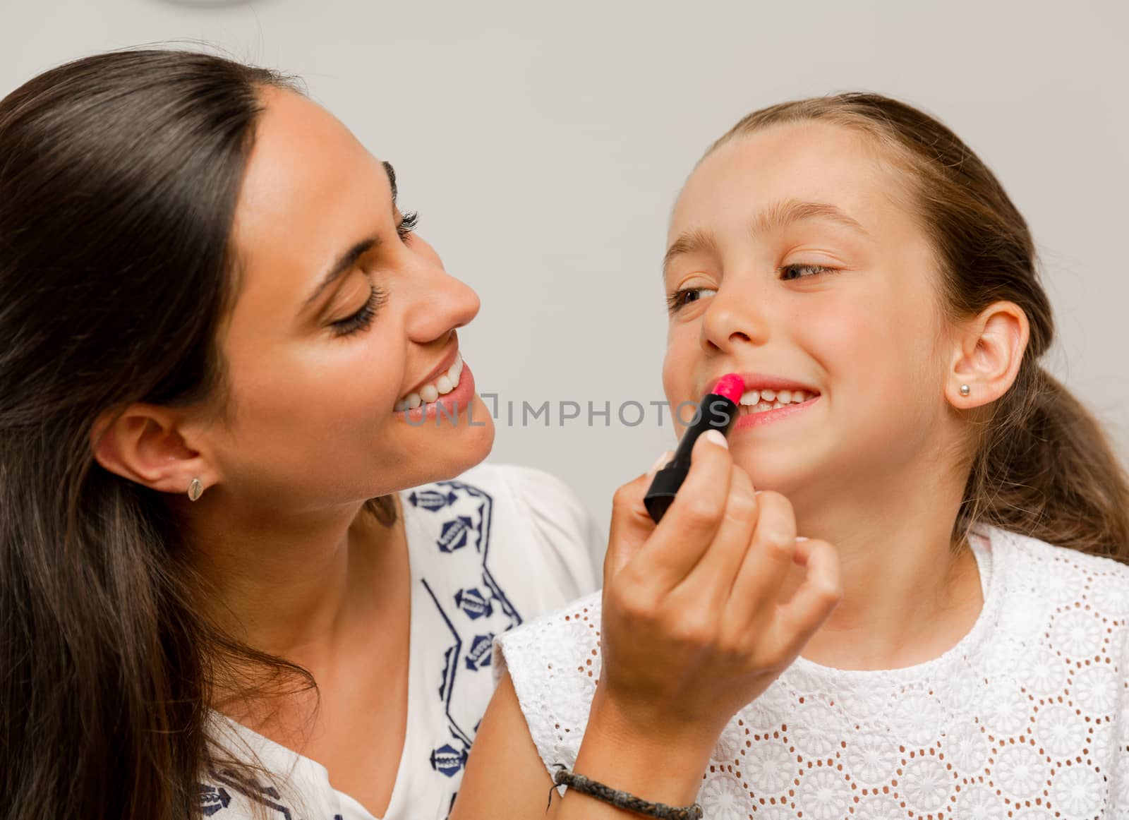 Mother and Daughter playing  by Iko