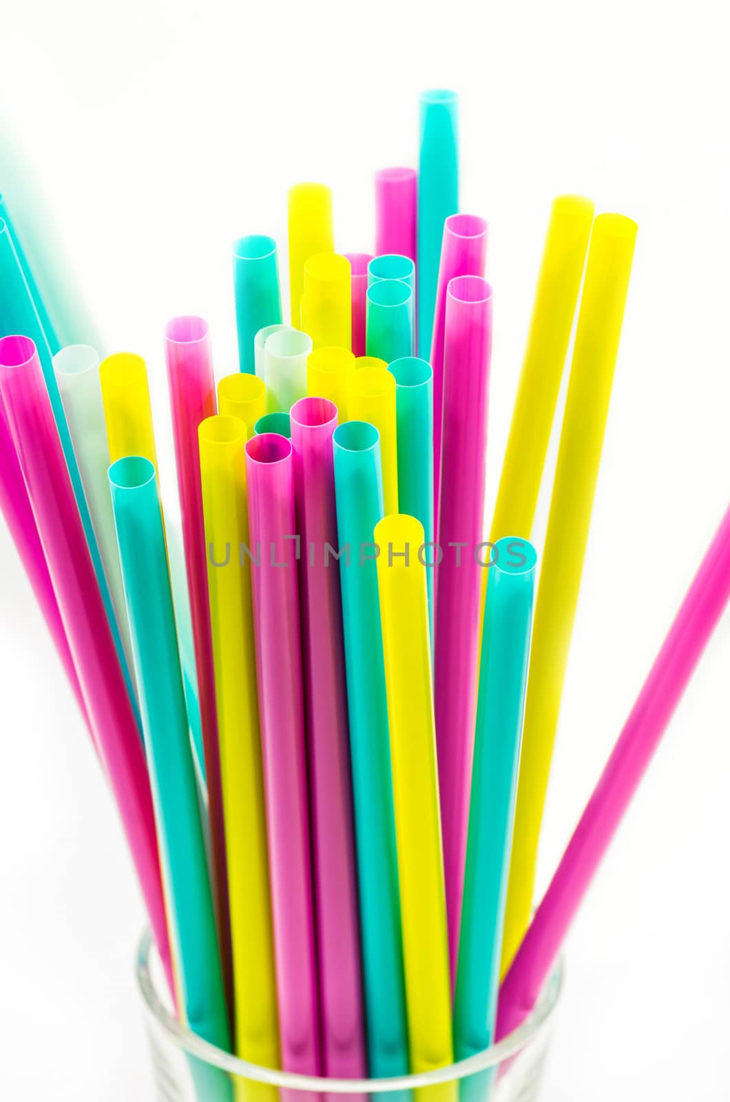 colorful drinking straws on the white background