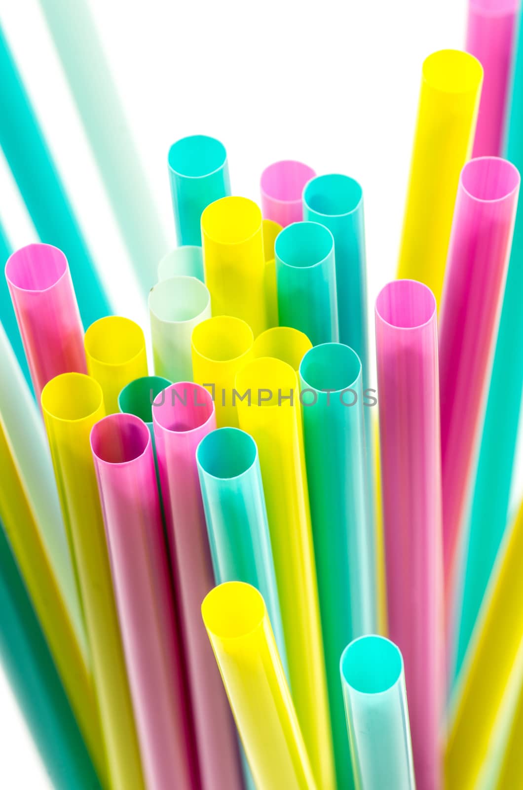colorful drinking straws on the white background