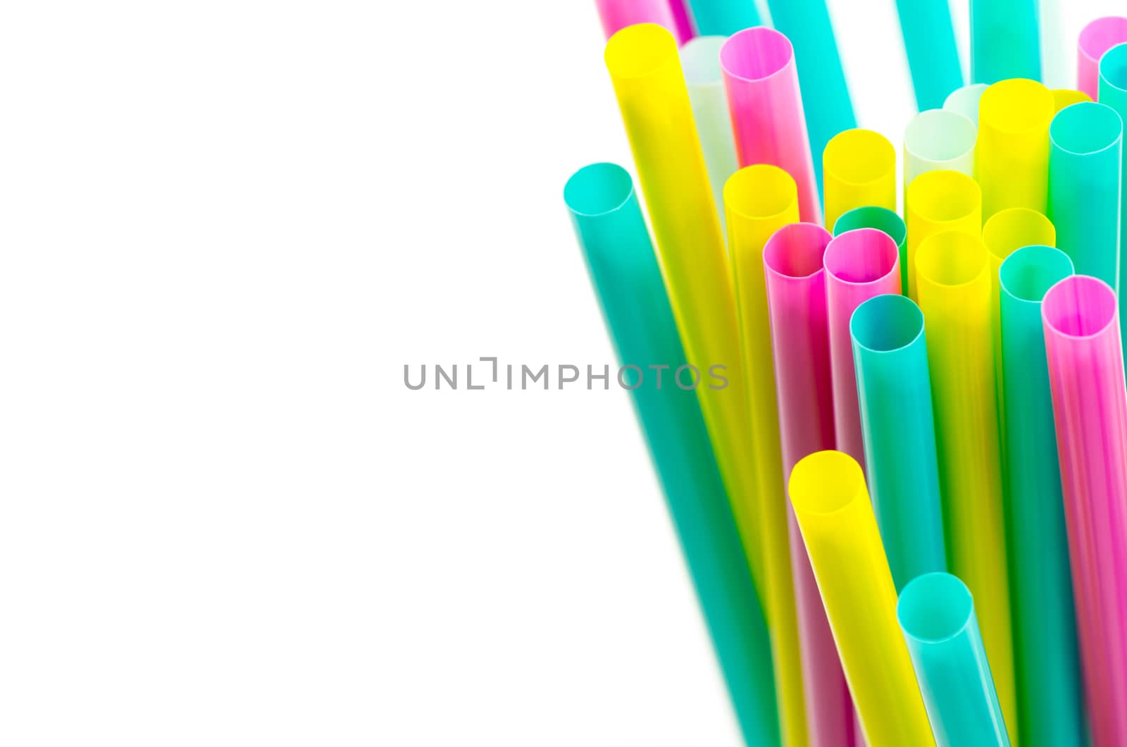 colorful drinking straws on the white background