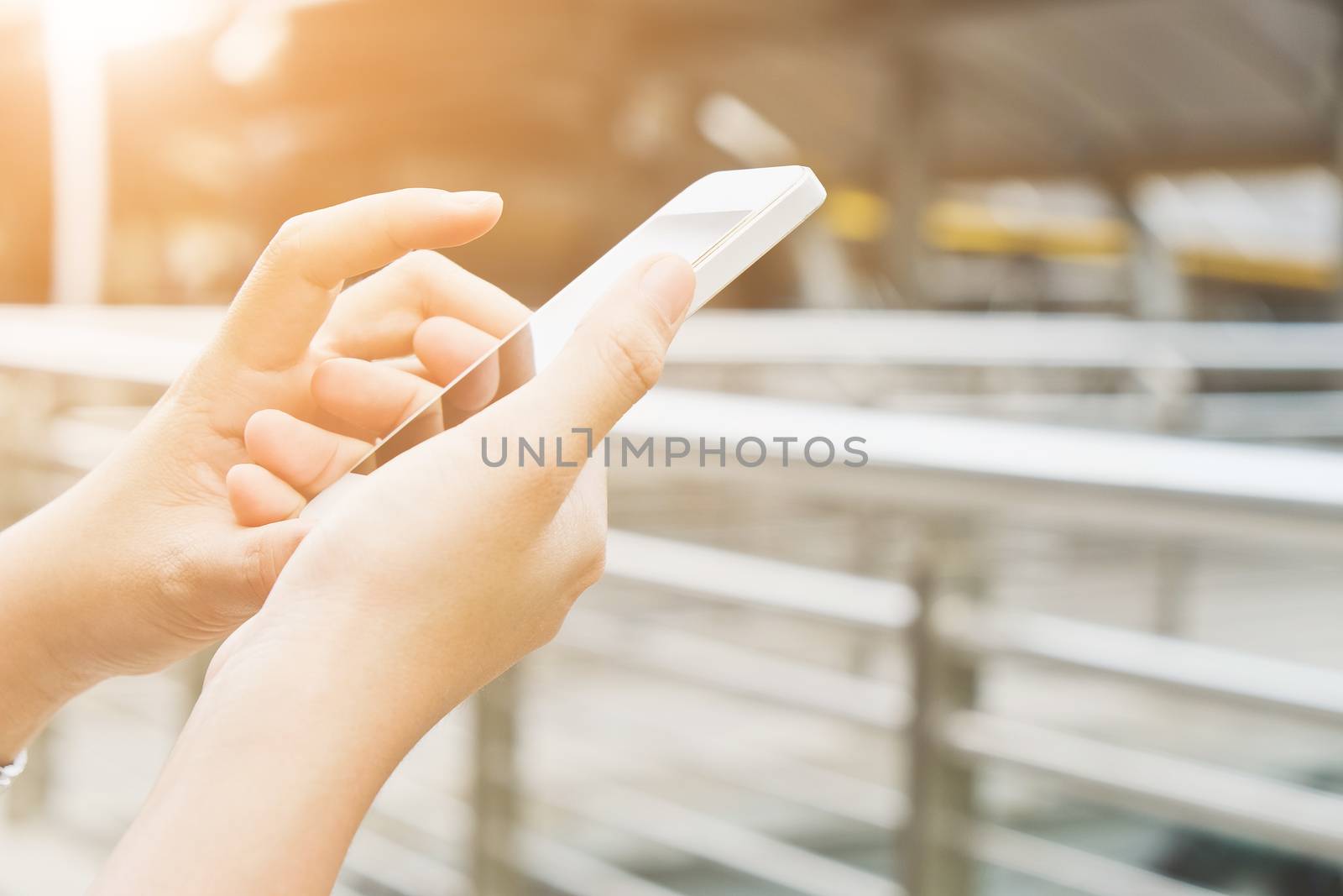 communication technology,close up of hand typing on phone