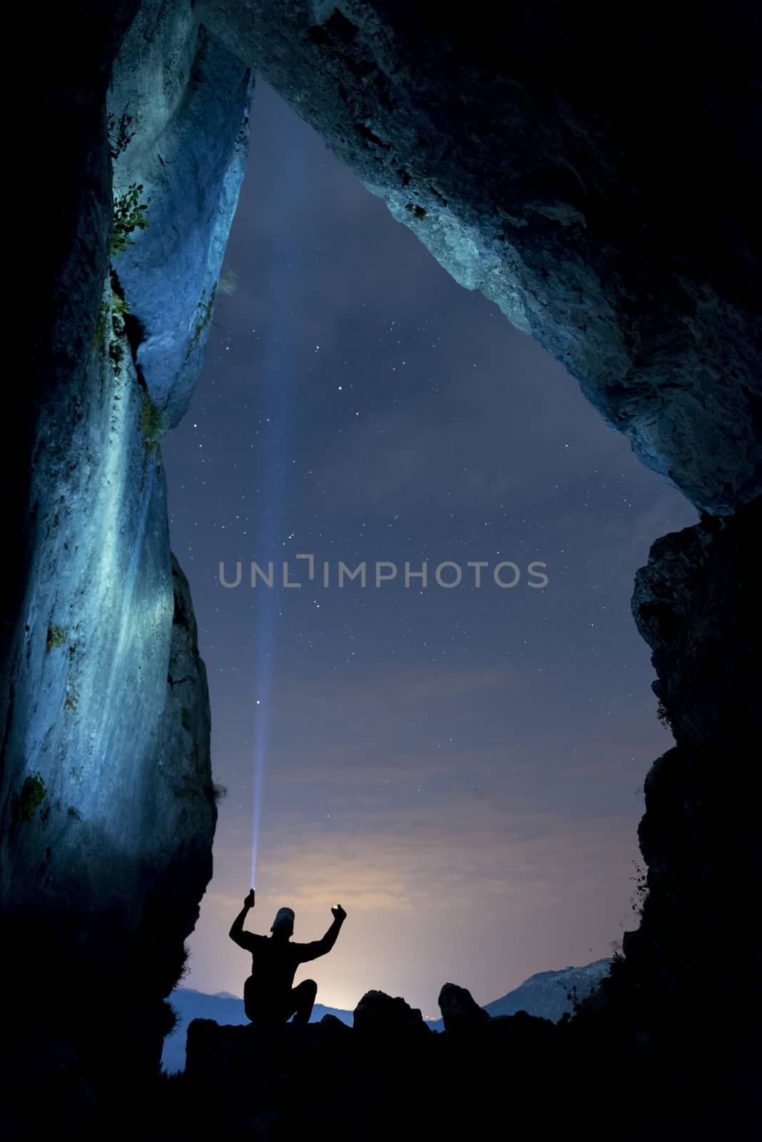 man in the caves in the darkness of the night by crazymedia007