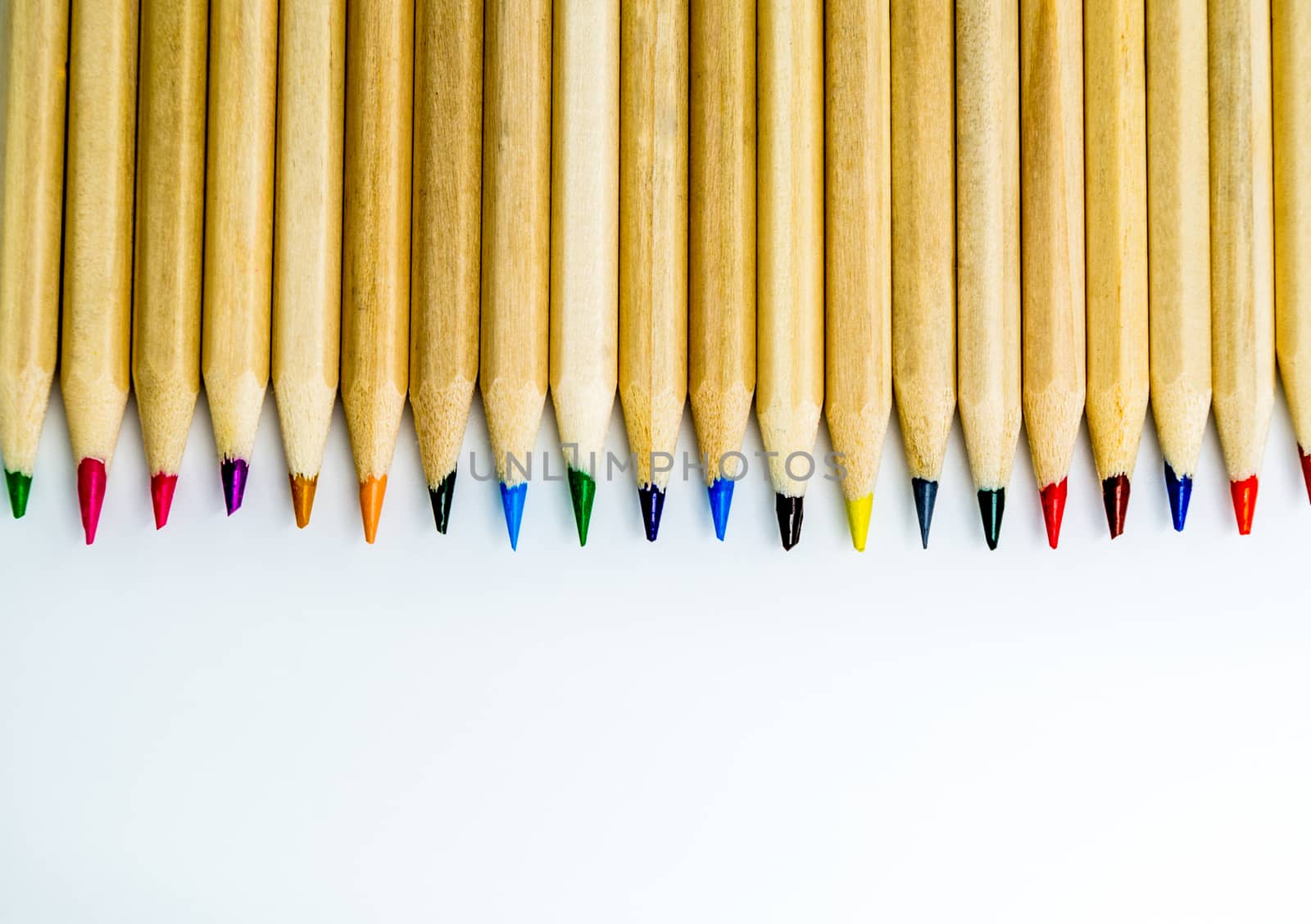 Colorful pencils white background by Desperada