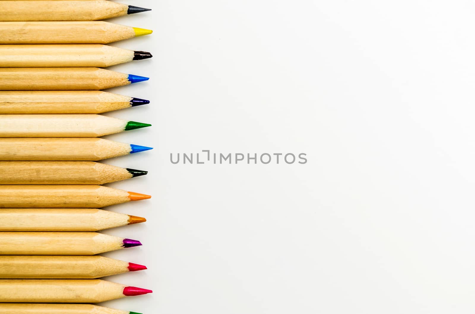 Colorful pencils on the white background