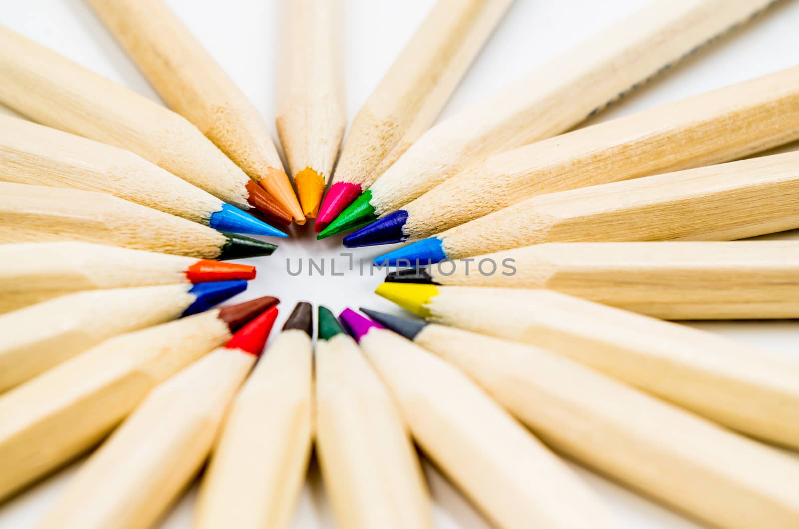 Colorful pencils white background by Desperada