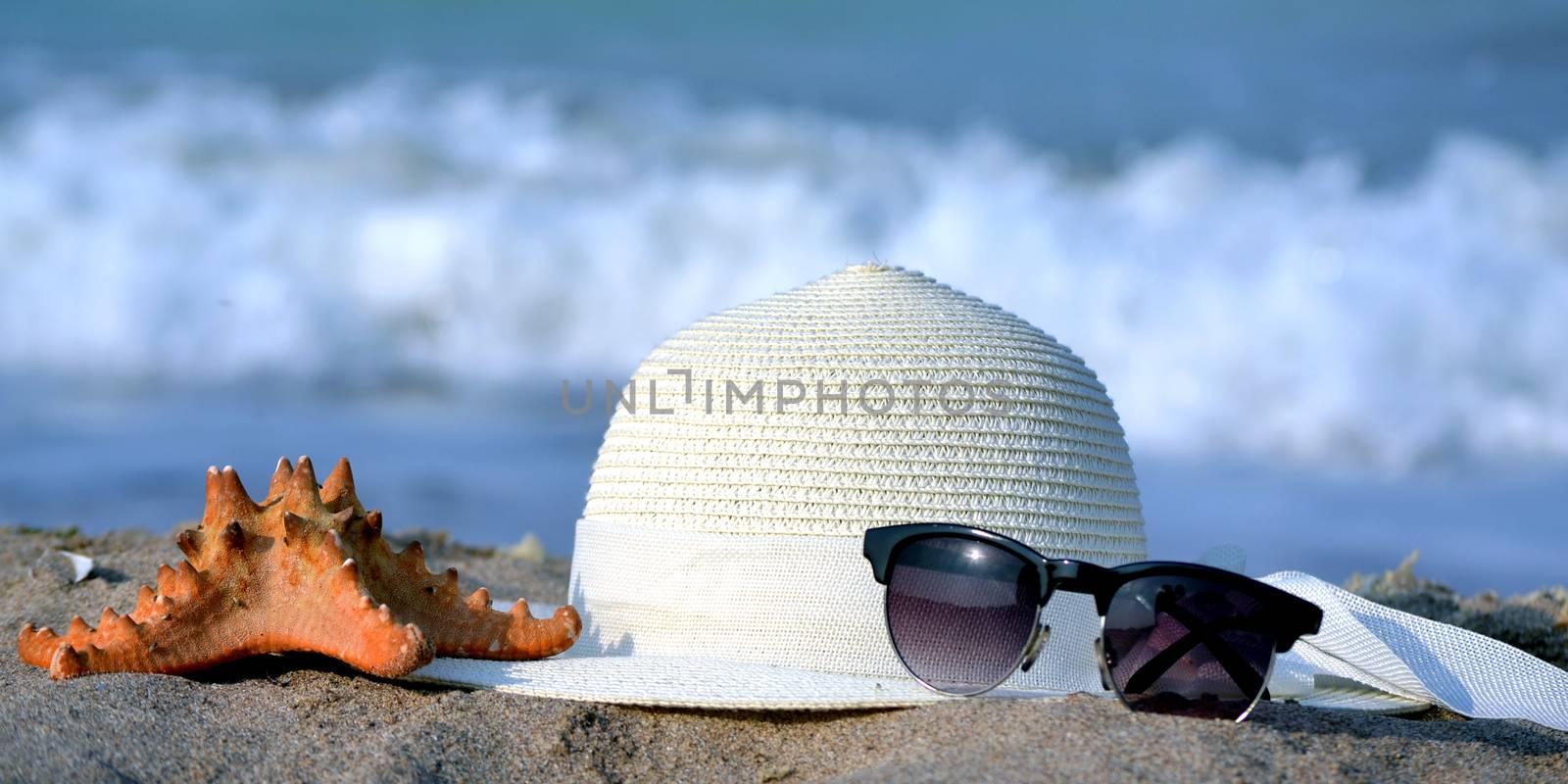 Summer concept, isolated sunglasses and hat by hibrida13