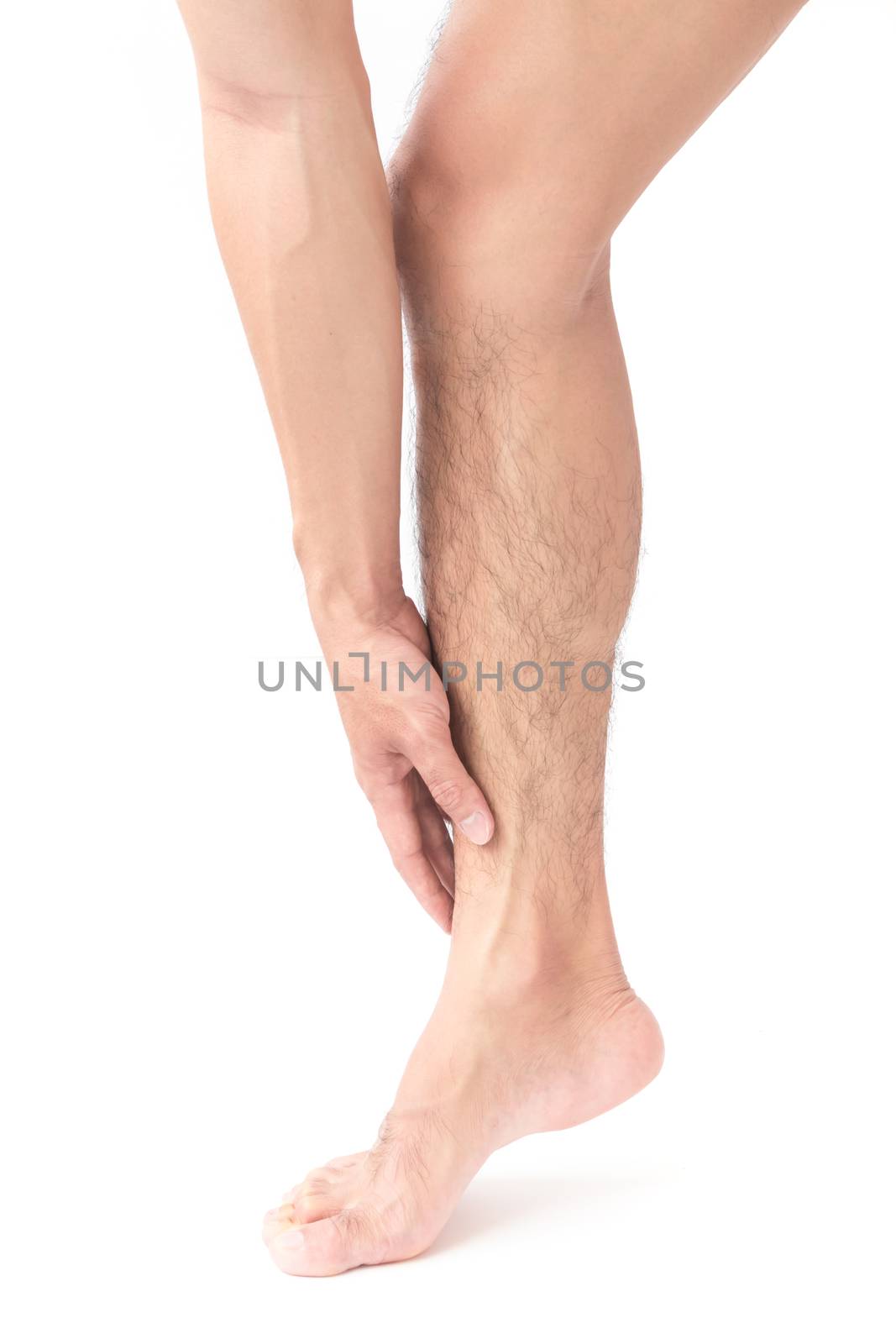 Man hand holding ankle leg pain with white background by pt.pongsak@gmail.com