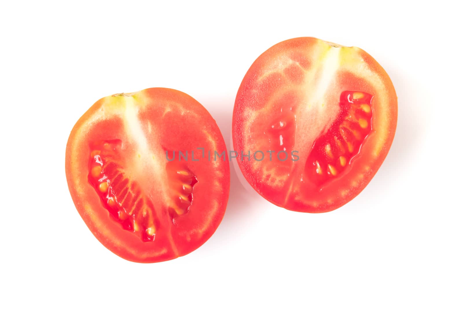 Fresh tomatoe slices on white background, selective focus