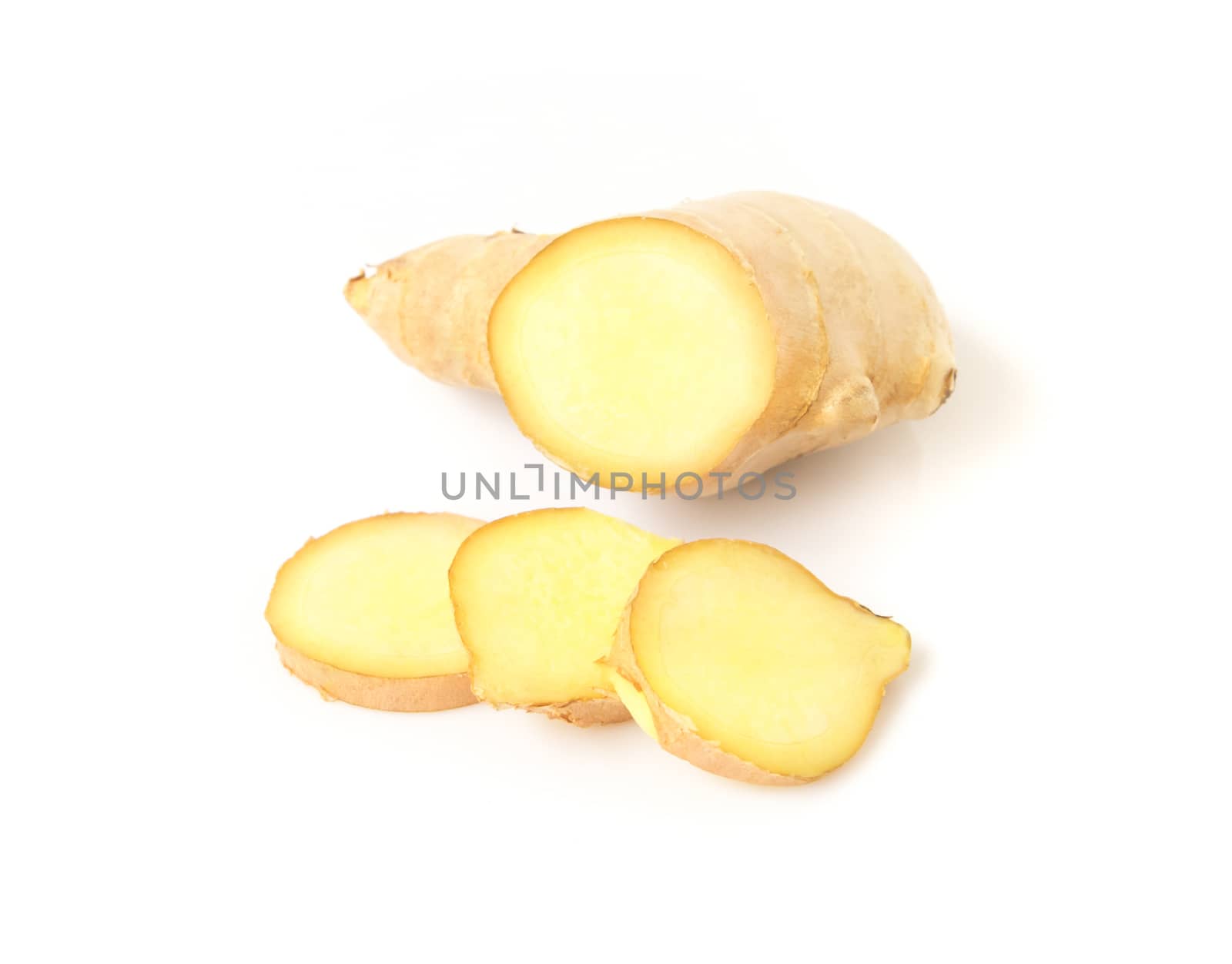 Fresh ginger slices on white background, herb and raw material cooking