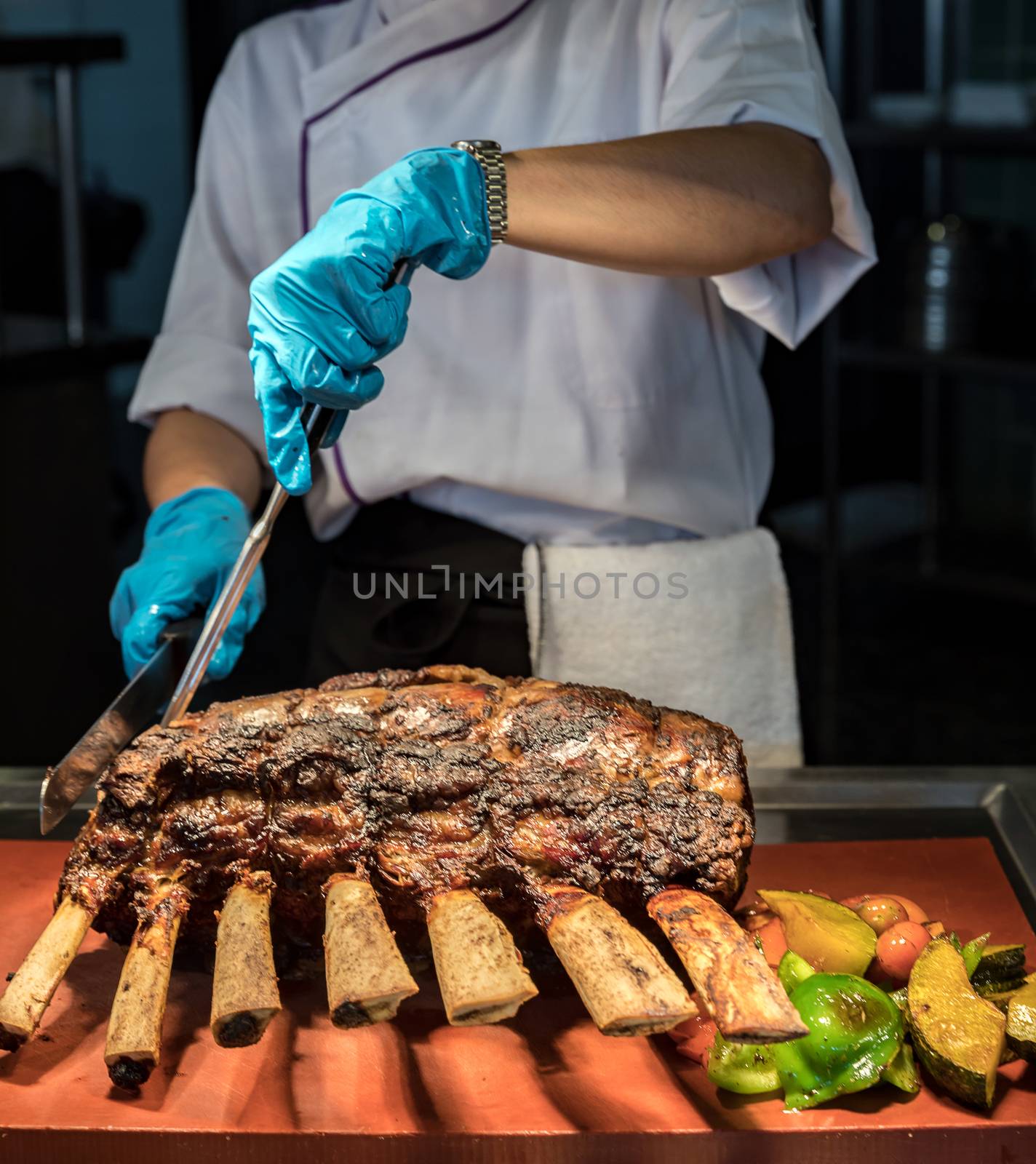 Chef carving beef by vichie81