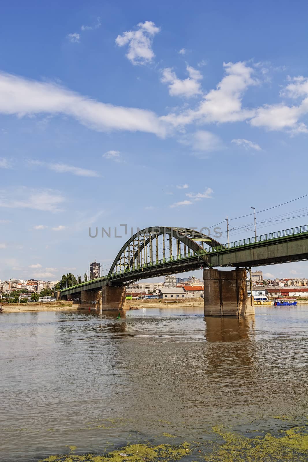 Panorama view on bridge over the river, who connecting two parts of the town