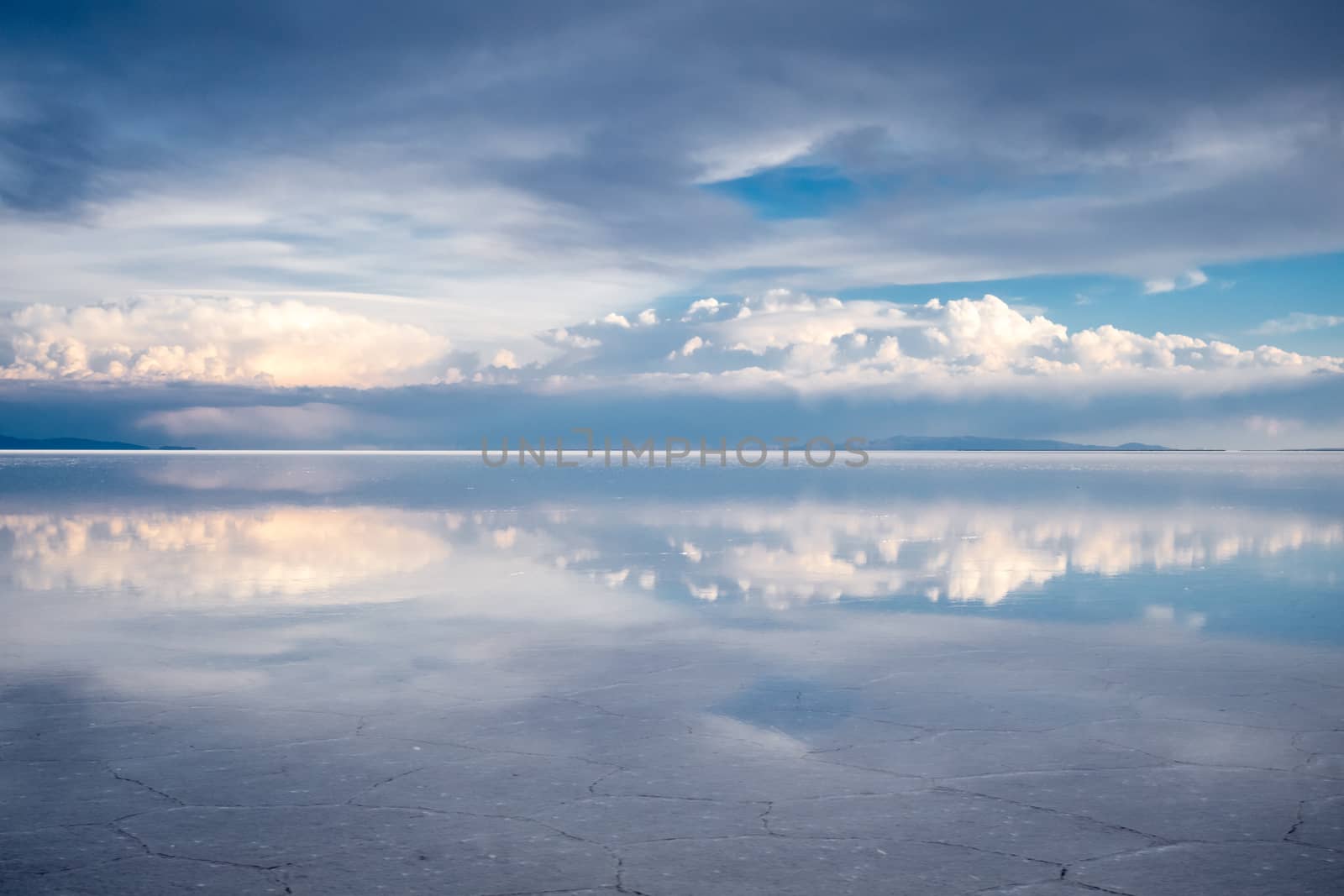 Sunset in Salar de Uyuni salt flats desert, Andes Altiplano, Bolivia