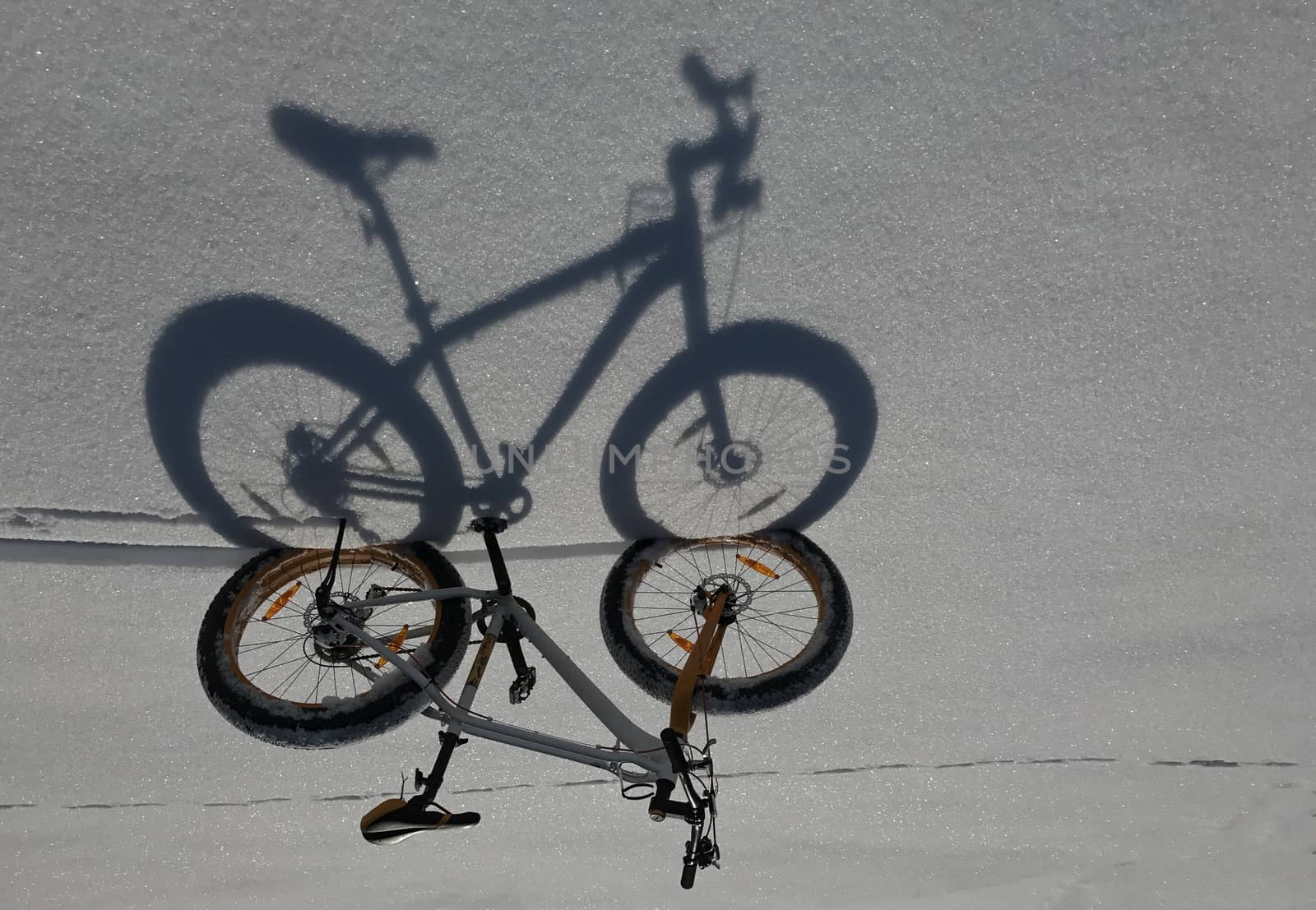Shadow of snow bicycles by crazymedia007