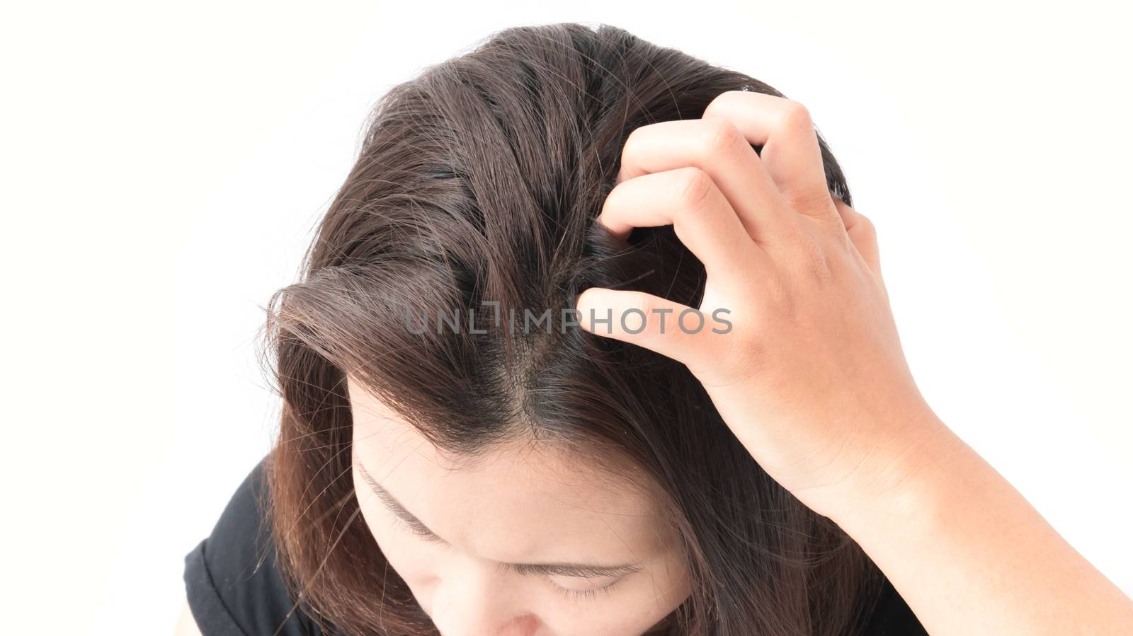 Closeup woman hand itchy scalp, Hair care concept by pt.pongsak@gmail.com