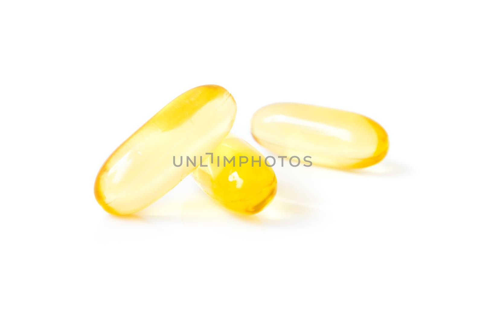 Closeup fish oil capsules on white background, health care and m by pt.pongsak@gmail.com