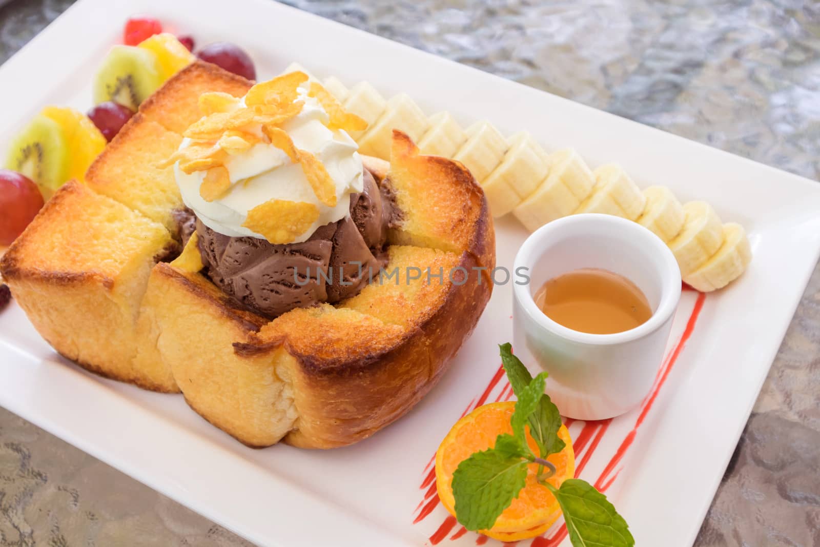 Closeup Honey Toast on white plate, selective focus by pt.pongsak@gmail.com