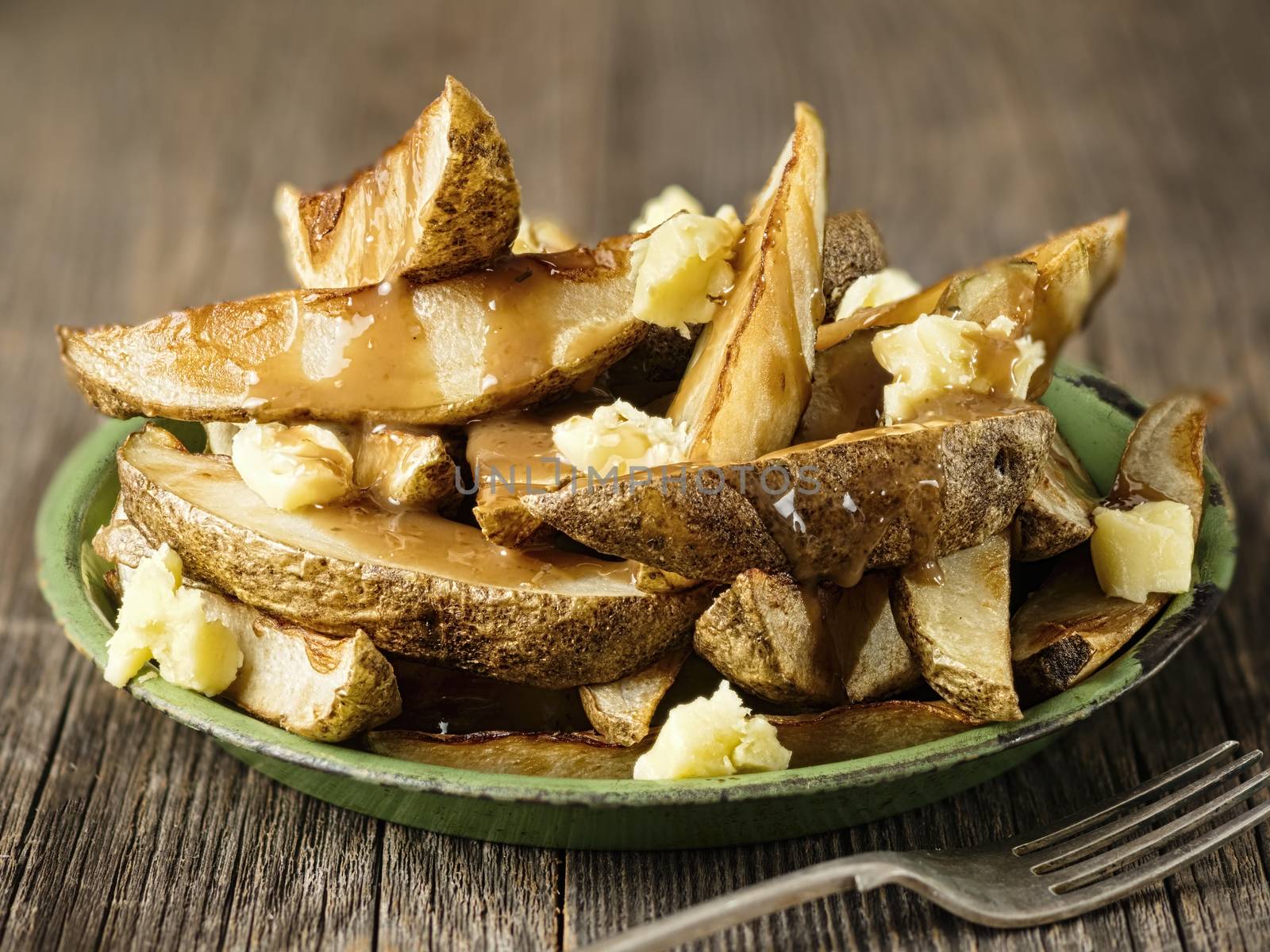 close up of rustic canadian poutine