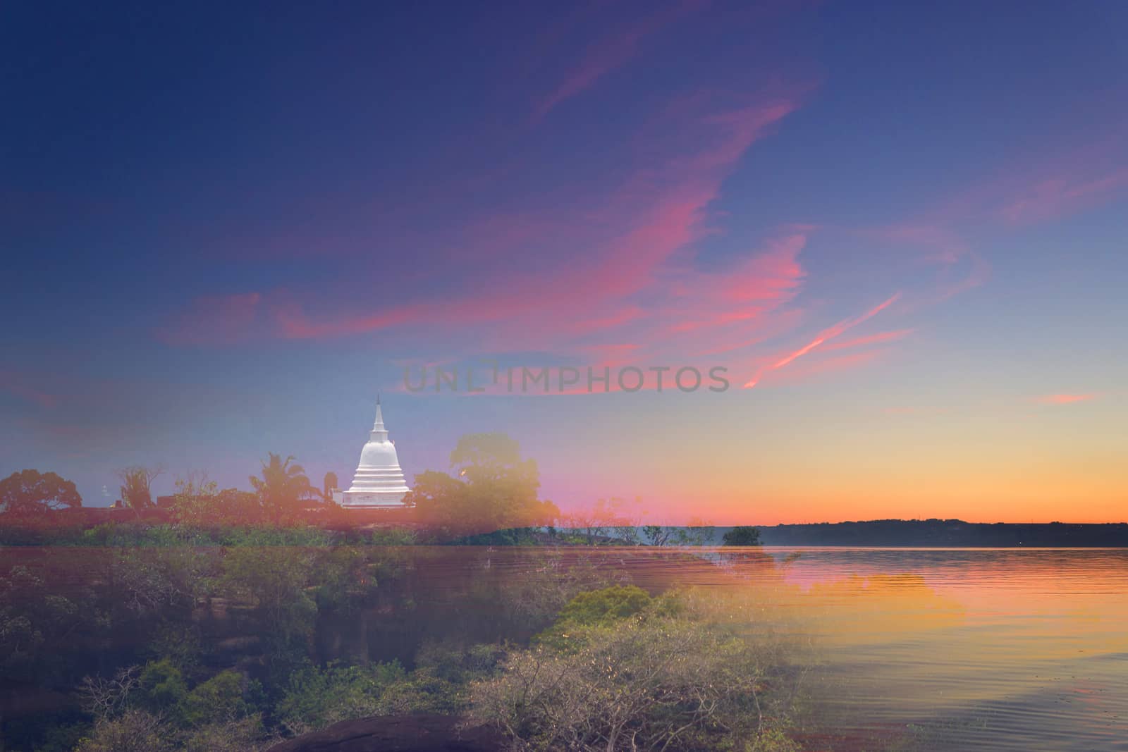 beautiful Scenic sunset over ocean and white pagoda