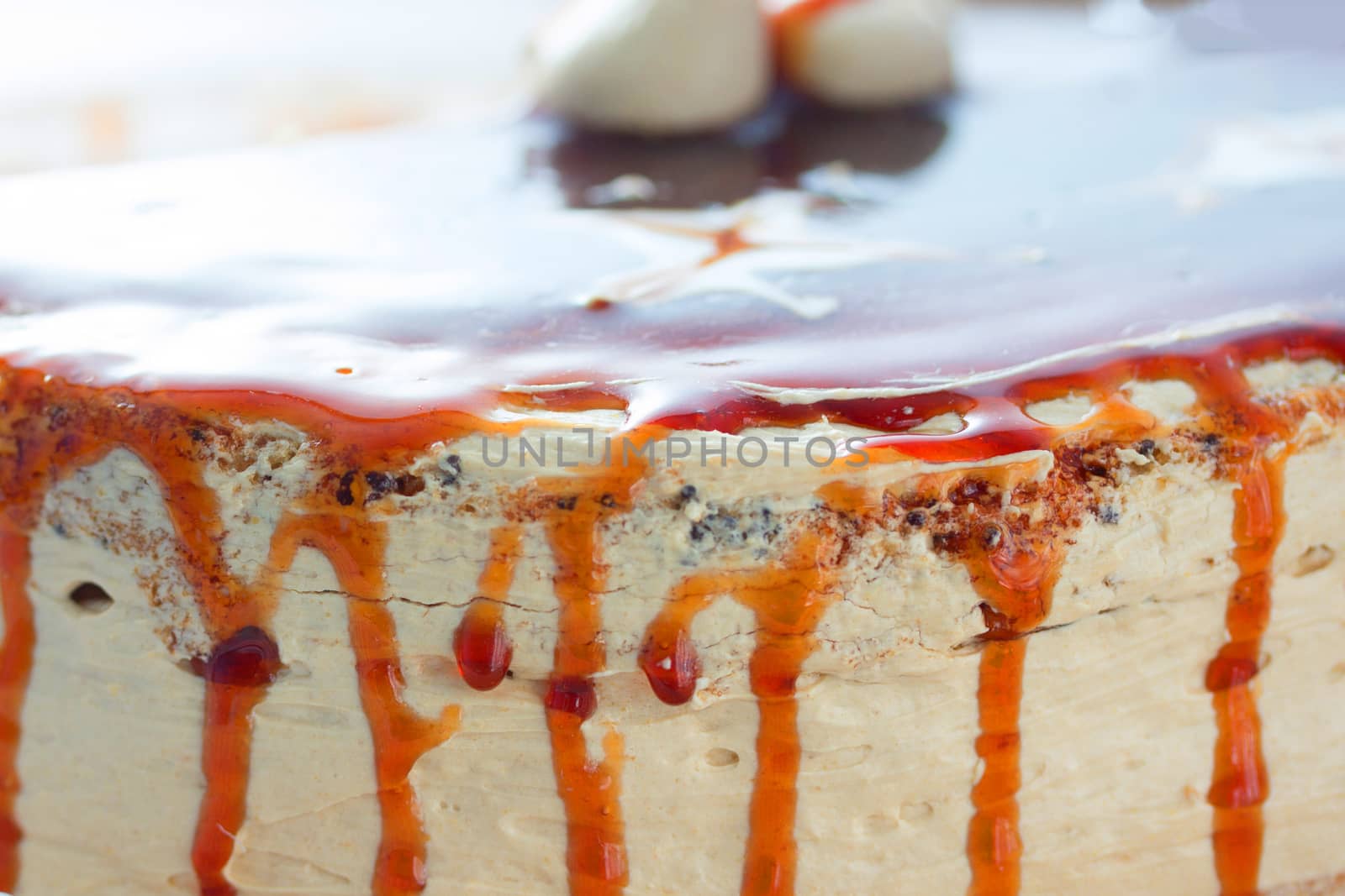 caramel topping on the cake. close up