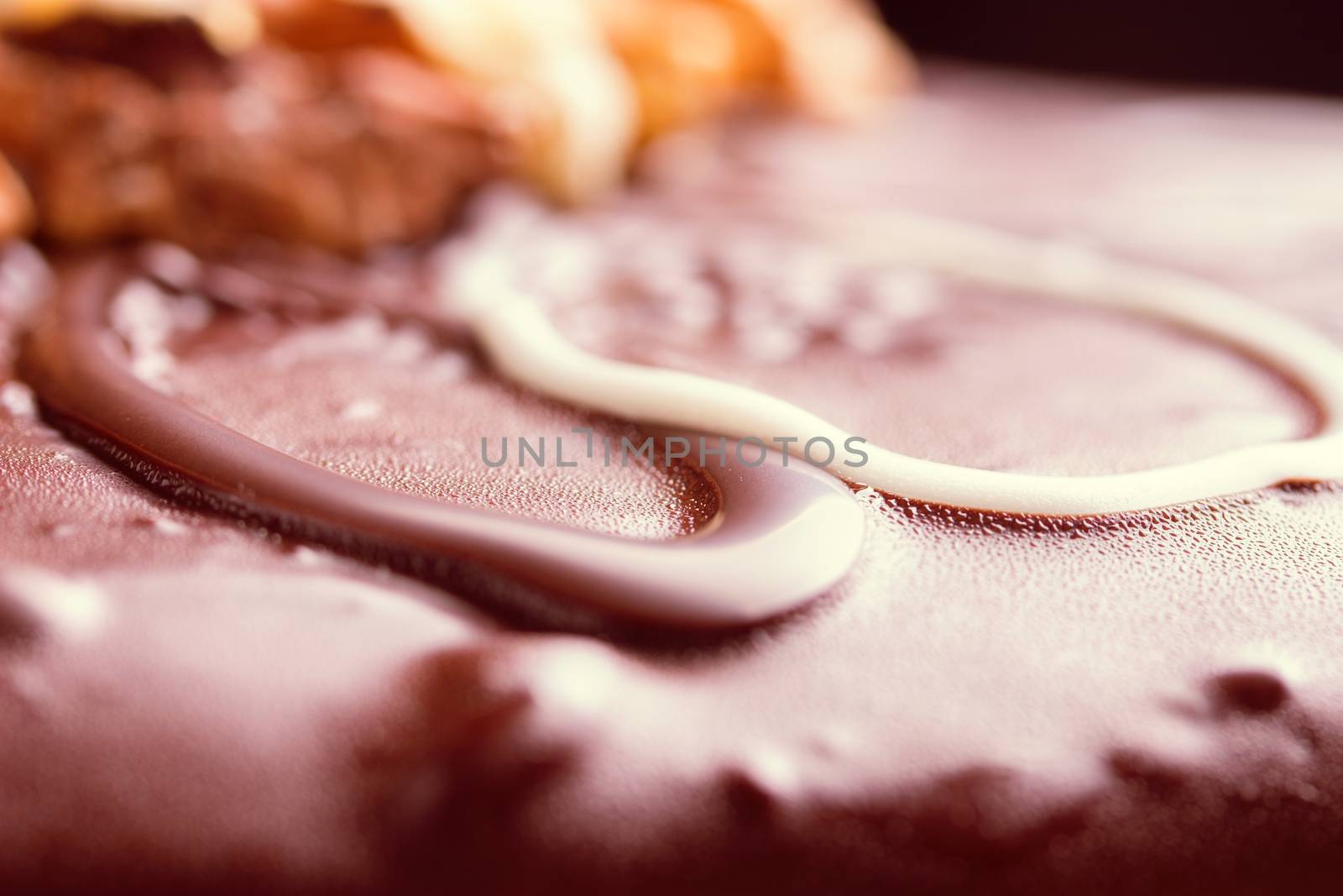 close up of chocolate cake with nuts