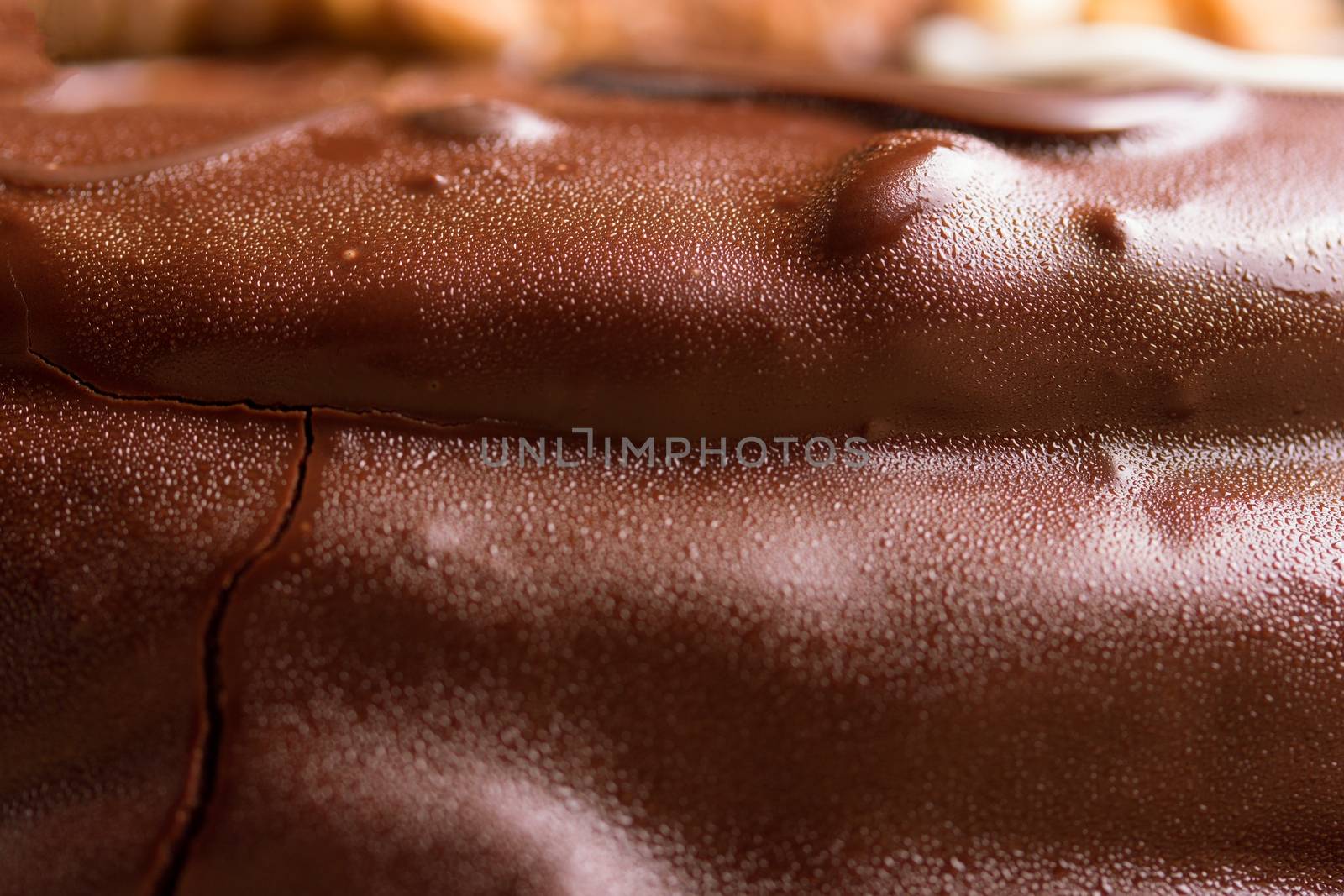 close up of chocolate cake with nuts