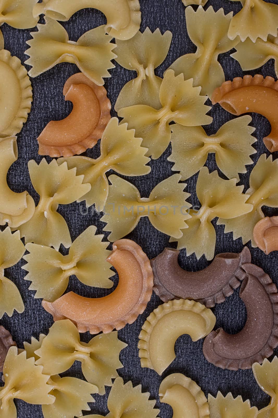 Variety of types of Italian pasta background by victosha