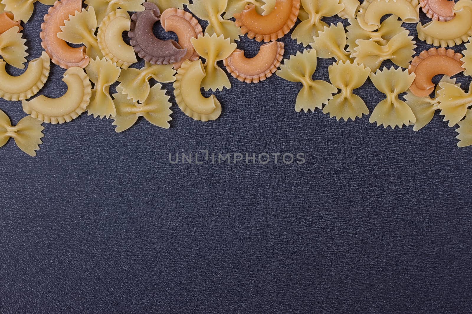 Variety of types of Italian pasta background by victosha