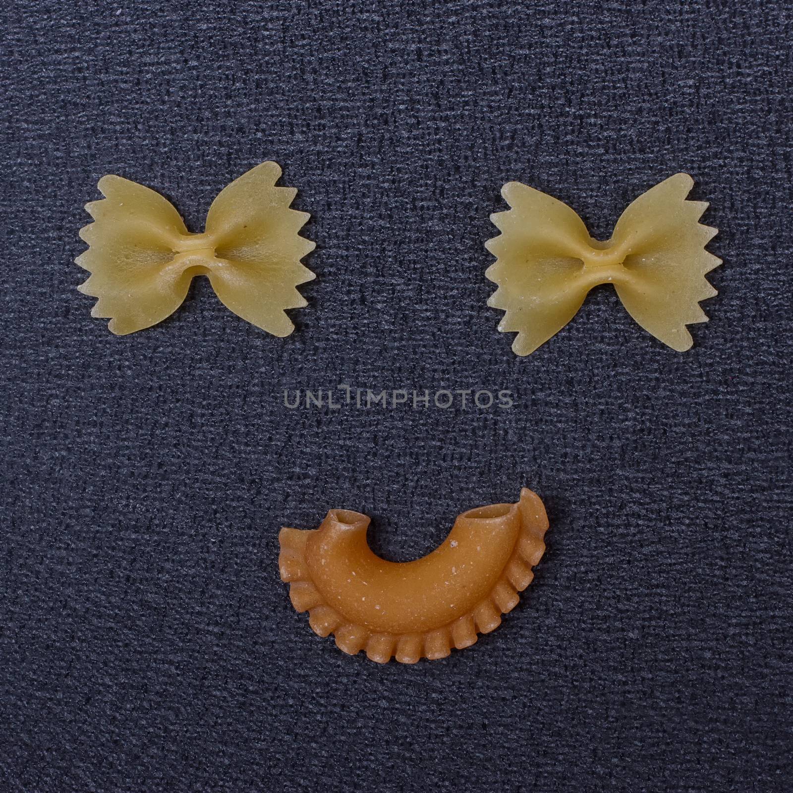 Smiling raw pasta by victosha