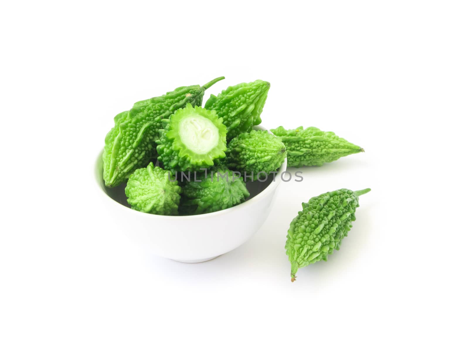 Momordica charantia in bowl on white background by pt.pongsak@gmail.com