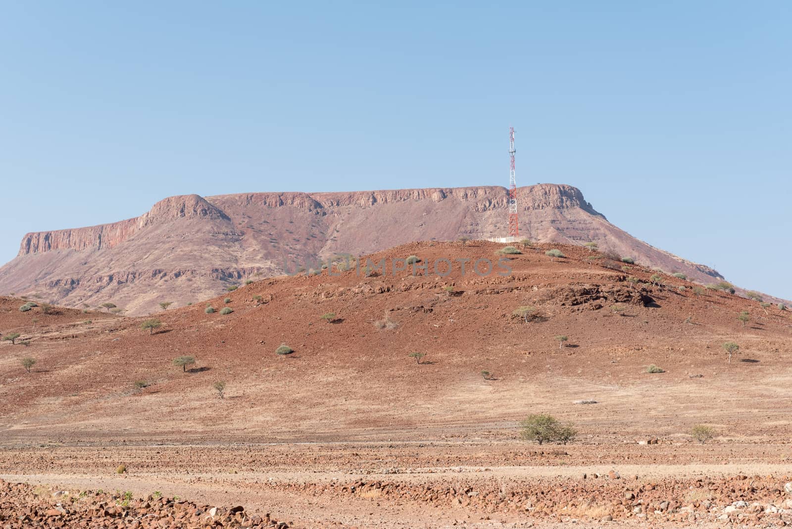 Cellphone tower on hill in the semi-desert landscape, Bergsig by dpreezg