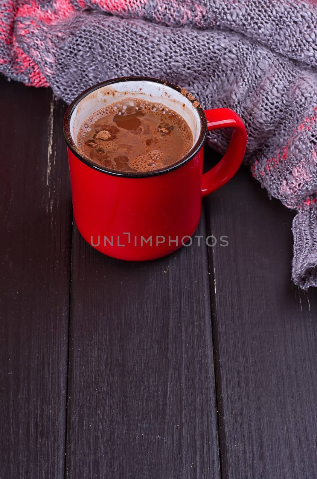 Aromatic cocoa drink. On black rustic background with Sweater