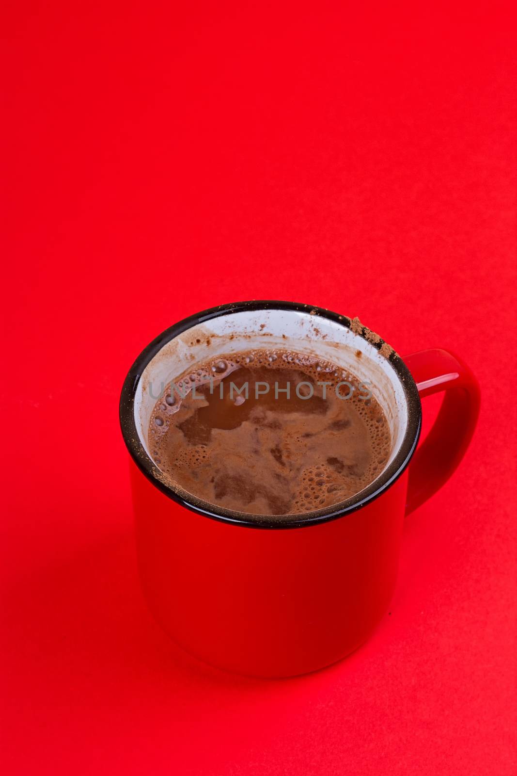 Aromatic cocoa drink. On a black background