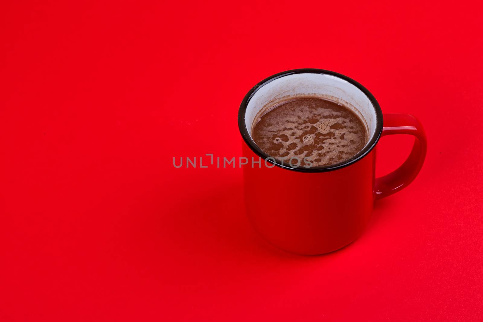 Aromatic cocoa drink. On a black background